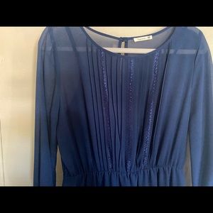 S Soprano blue dress, below the knee. 3/4 sleeve.